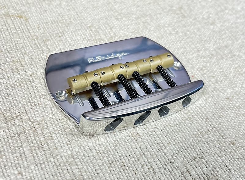 Sterling RAY4 by AlBridge Parts BSMM420 “MM Style” Bass 4-String Bridge For Sterling RAY4 SUB Polished